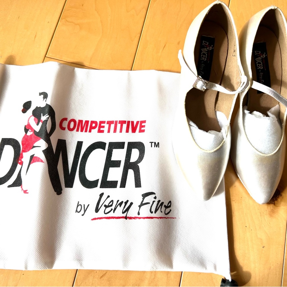 Brand new Very Fine white satin ballroom dance shoes. Suede sole.